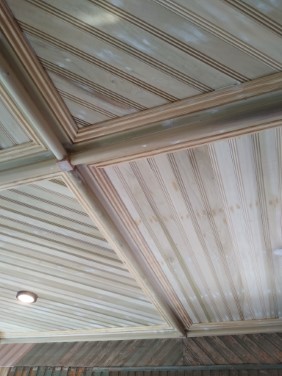 mezzanine ceiling trim consisting of angled beadboard and vertical beadboard